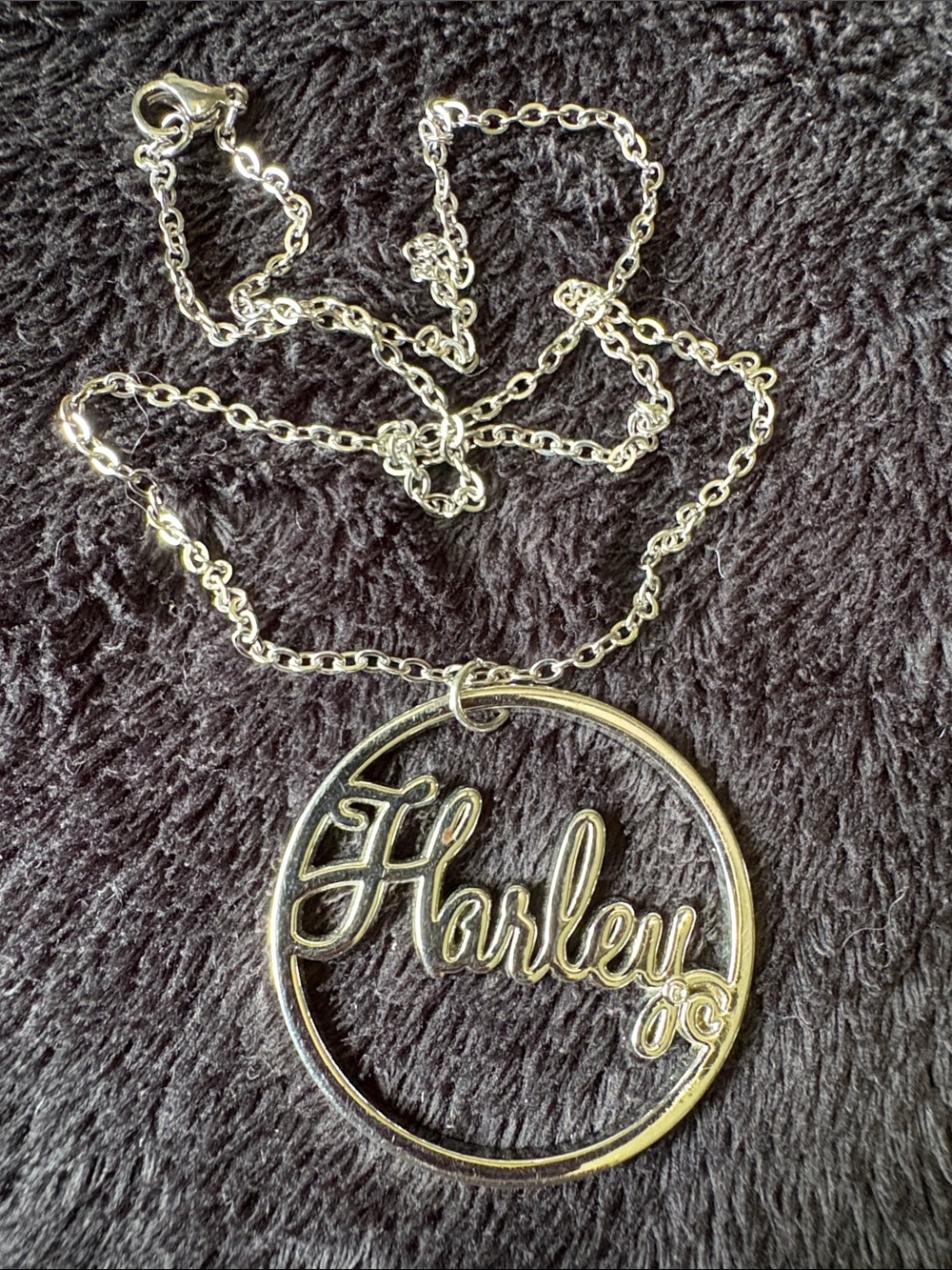 Authentic Harley Davidson Pendent. 
Feminine Script “Harley” Circular Pendant.